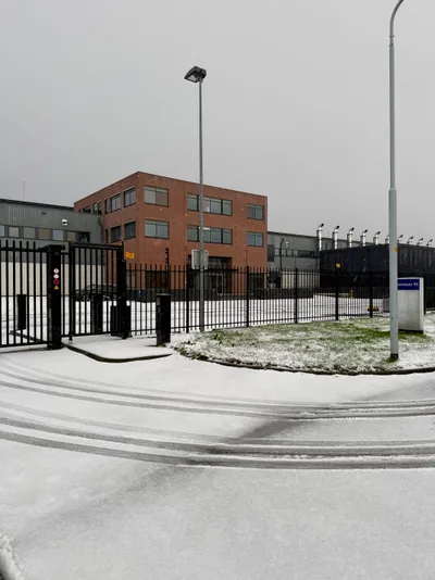 Data center building in winter snow, Schiphol-Rijk